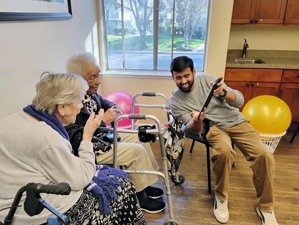 Careflick sharing technology with older adults at Atria